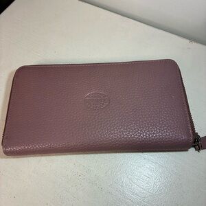 Roots Zip around Wallet in mauve (light purple). EUC. Space for cash/cards/coin
